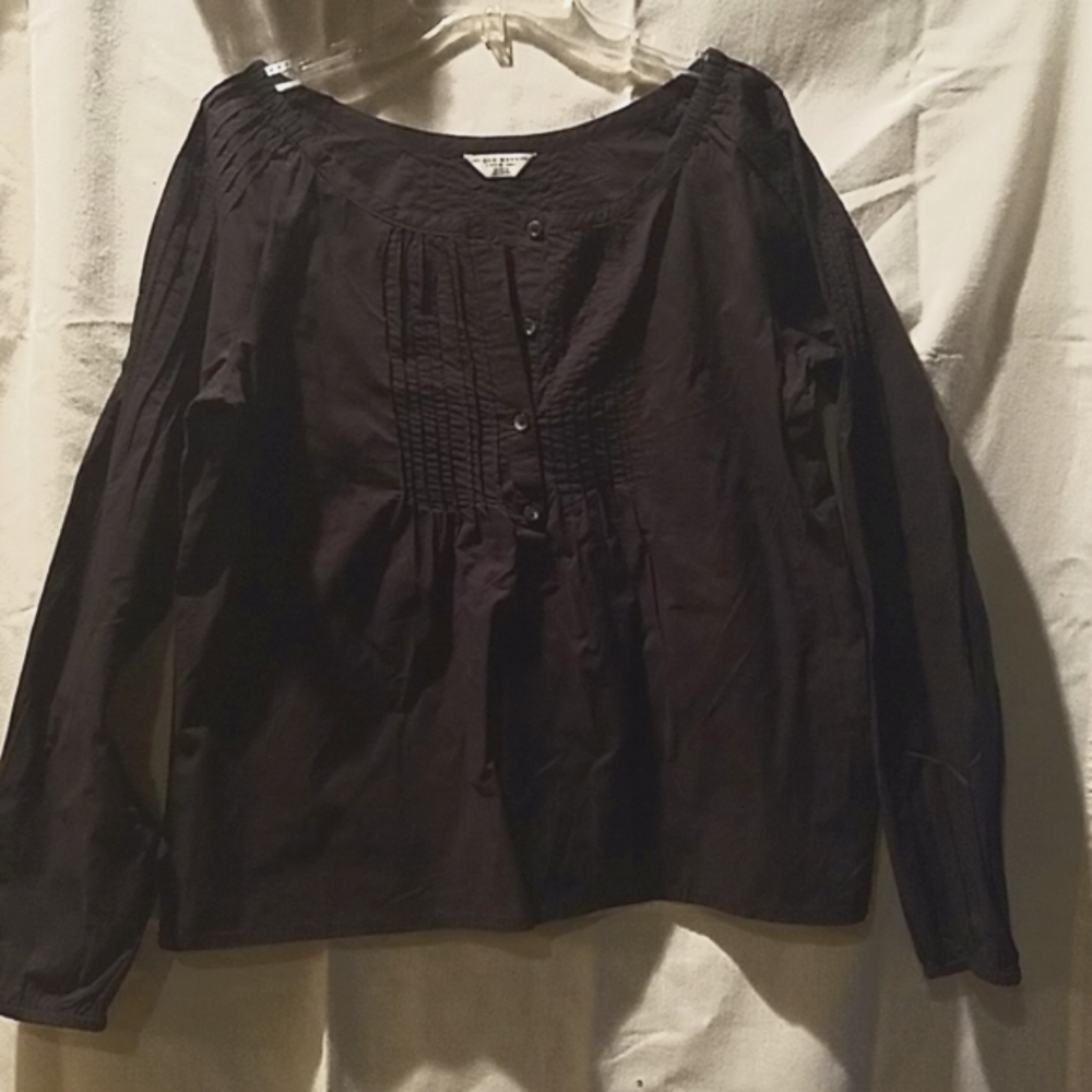 Black cotton, 4 button long sleeve shirt.